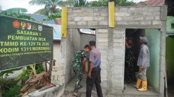 Plester Dinding MCK Masjid Quba Desa Umbele Terus Berlanjut bukti nyata kinerja Satgas TMMD