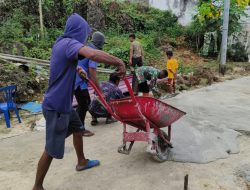 Satgas TMMD Ke-129 Kodim 1311/Morowali dan Warga Percepat Pembangunan Rabat Jalan Beton di Desa Polewali