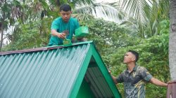 Pengecatan Lisplang dan Kamar Mandi MCK SDN Umbele, Progres TMMD Ke-129 Terus Berlanjut