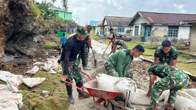 Gotong Royong Satgas TMMD dan Warga Percepat Pekerjaan Rabat Beton Jalan di Desa Polewali