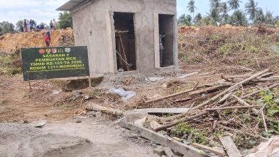 Pembangunan MCK Masjid Quba Desa Umbele Masuki Tahap Pengecatan dan Pemasangan Tegel Kamar Mandi
